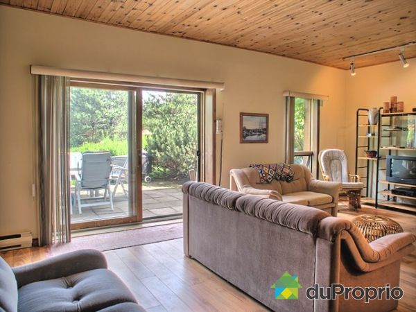 Family Room - Patio door leading to back yard  patio with concrete slabs (18X18)