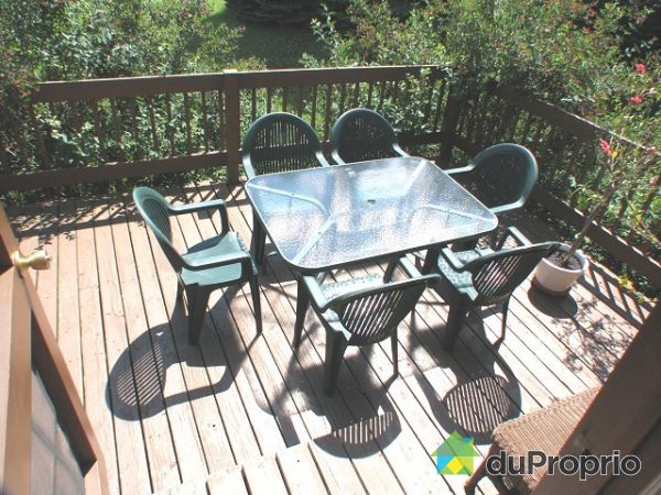 Patio - Adjacent to living room. Retractable awning.