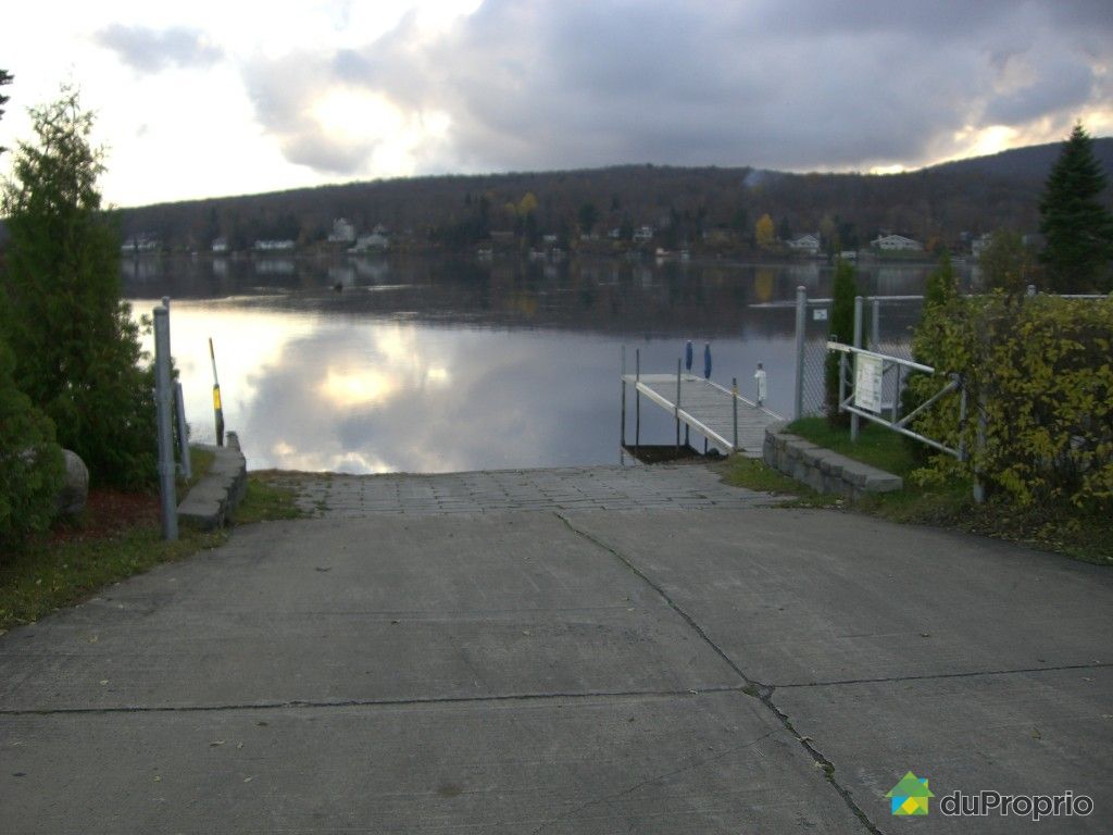 Terrain résidentiel vendu FossambaultSurLeLac, immobilier Québec
