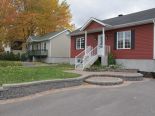 Bungalow � Pointe-Calumet, Laurentides via le proprio