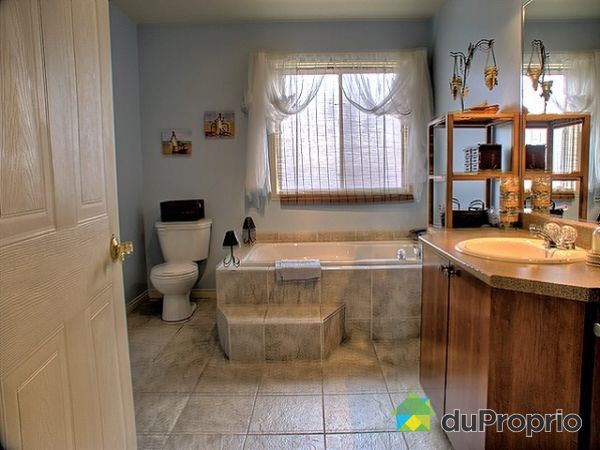Bathroom - Large shower, round 38in.  Podium bath.