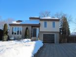 Maison à paliers multiples à Blainville, Laurentides Maison à paliers multiples à Blainville, Laurentides
