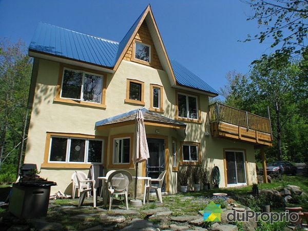 Fa&ccedil;ade - C&ocirc;t&eacute; Sud. Le c&ocirc;t&eacute; Sud compte 70% des ouvertures (concept solaire passif).
