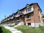 Townhouse in Candiac, Monteregie (Montreal South Shore)