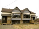 Semi-detached in St-Ferreol-les-Neiges, Quebec North Shore