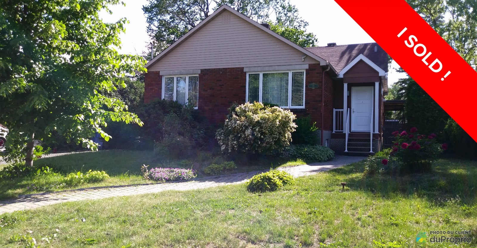 facadebungalowpointeclaire160011290003sold.jpg