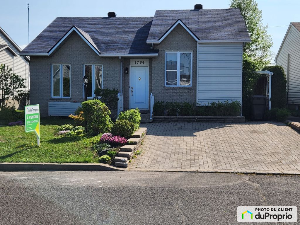 Maison à paliers multiples à vendre SteJulie 4 chambres 1040087