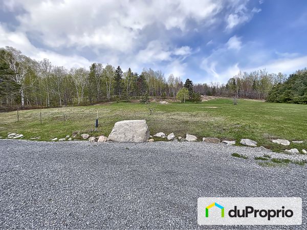 Cour arrière - 285 côte des Jalins, La Malbaie (St-Fidèle) à vendre