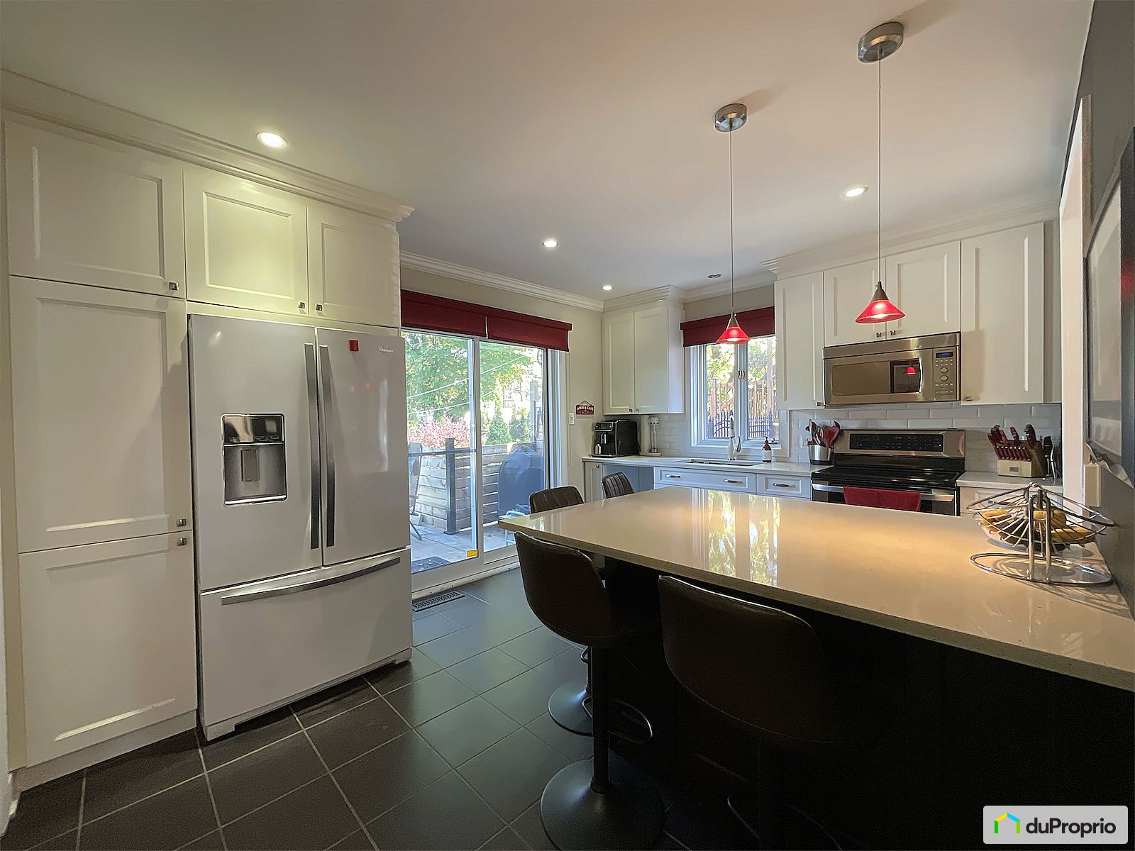 10415 10417 10419 Rue Saint Hu — photo 2