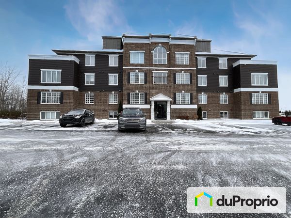 Condo - 404-317 rue Sainte-Catherine, St-Constant for sale