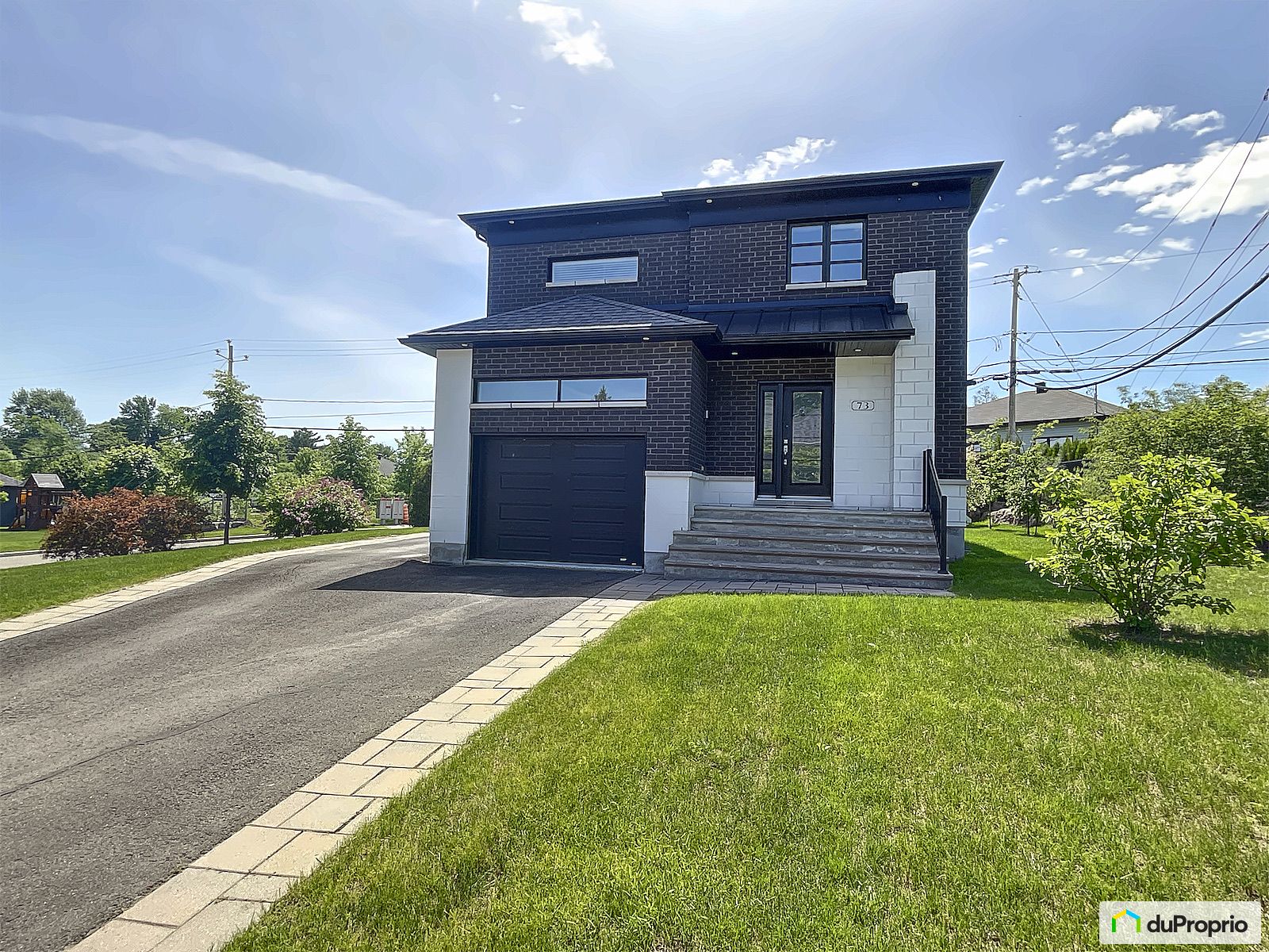 73 Rue J C Wilson — photo 1