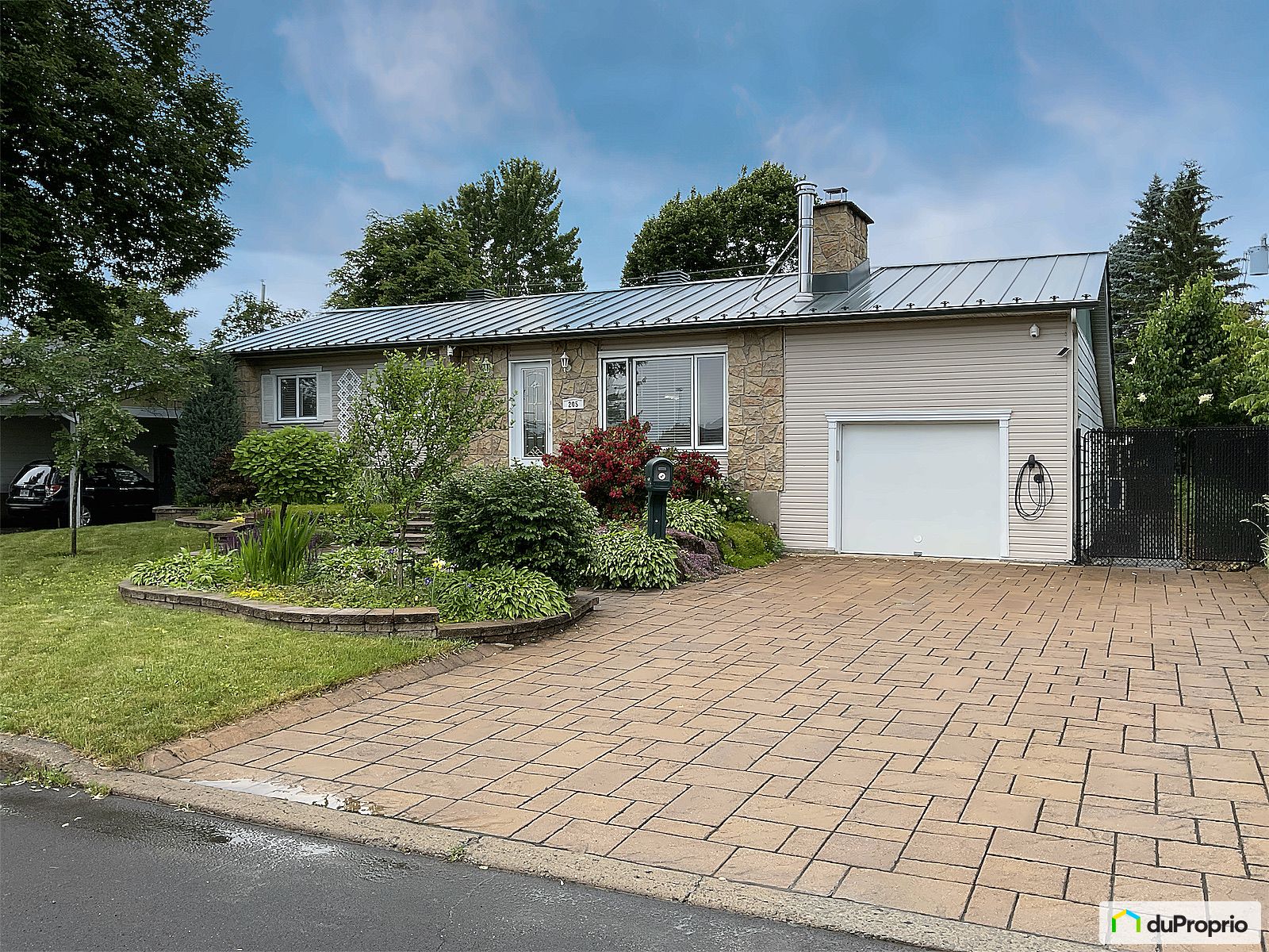 205 Rue Des Camelias — photo 1
