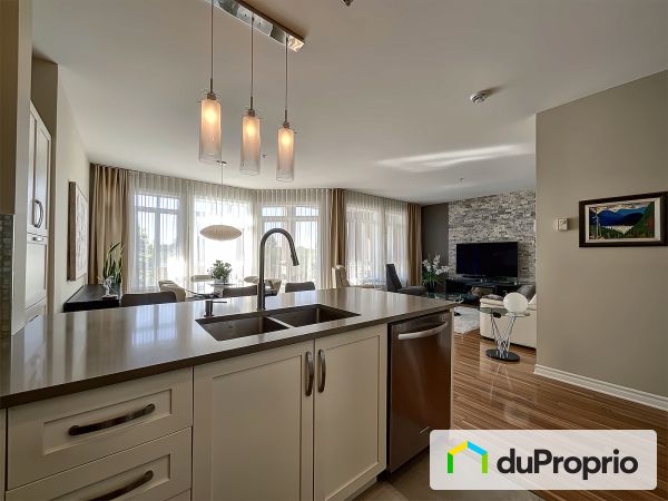Aire ouverte - 102-320, avenue du Golf, La Prairie à vendre
