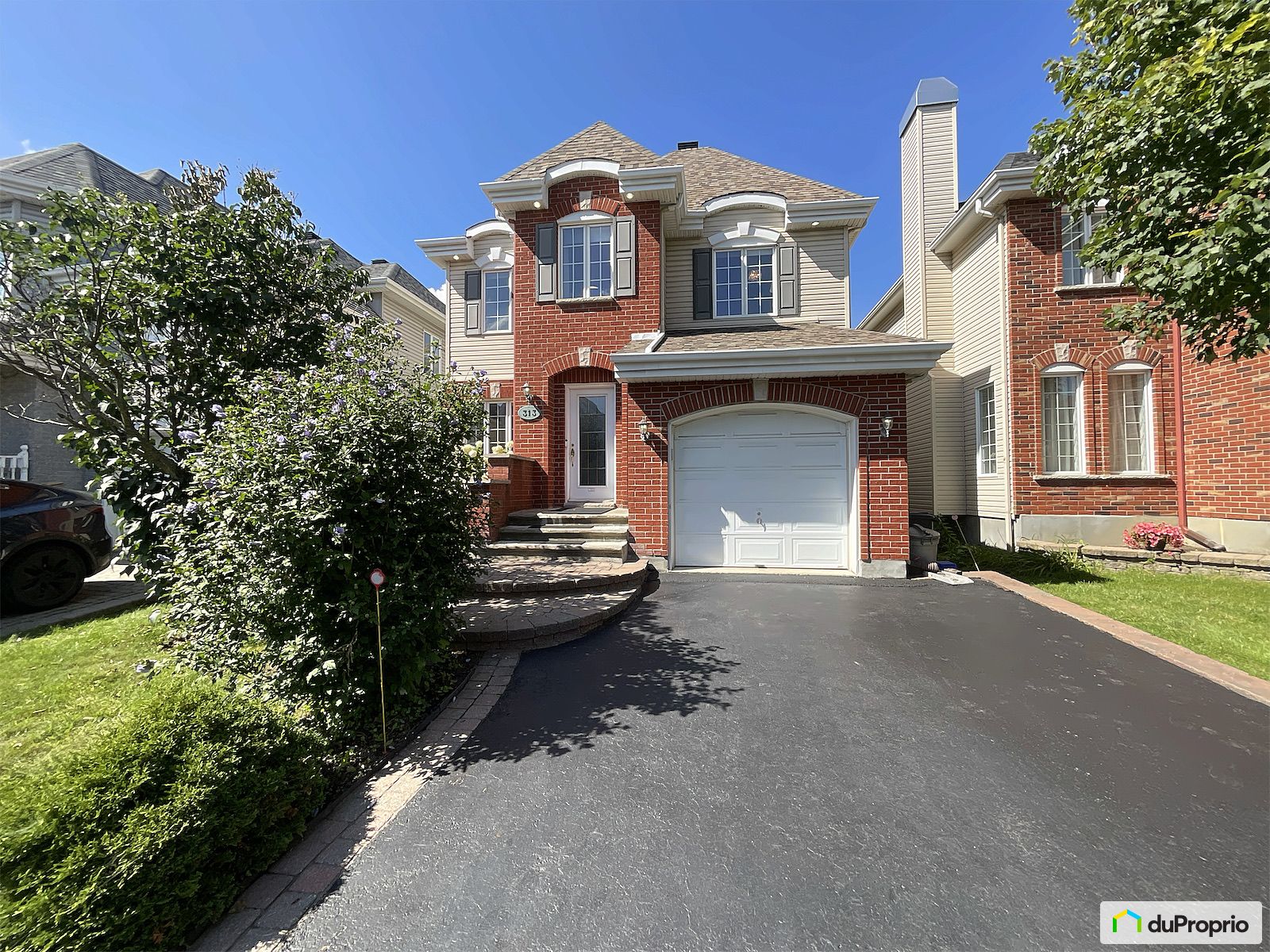 313 Rue Lauzon — photo 1