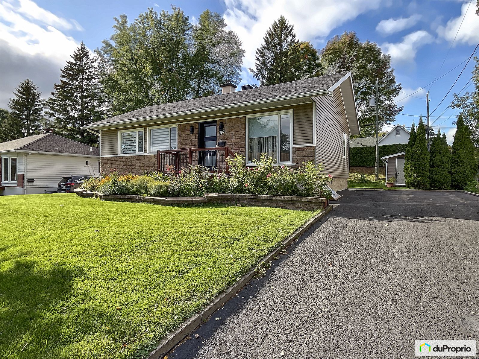 315 68E Rue Ouest — photo 1